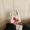 Bolsa de Ombro Nova Tendência Primavera 2026 Estampa Doce de Coração Amoroso Mini Bolsa de Mão Fofa de Desenho Animado Bolsa Transversal