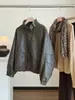 Chaqueta de Cuero para Mujer 2026 Otoño/Invierno Nueva Retro Temperamento Versátil Holgada con Cordón Cuello Alto Piel PU Chaqueta Casual Abrigo
