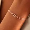 Europeu e americano novo nó osso de cobra latão amor nó ilimitado pulseira casal amor ilimitado ornamentos de mão