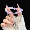 Pulsera de Bolas Dopamina de Verano para Mujer, con un Diseño Fresco y Dulce, Borlas Florales, Sensación de Alta Gama, Pulsera Versátil