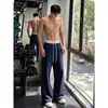 Estampado floral blanco, drapeado, pantalones casuales de peso pesado para hombre de otoño estilo americano, corte recto limpio, ligeramente acampanados
