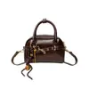 Bolsa Satchel de Alta Qualidade Simples Bolsa de Boliche para Mulheres Verão 2025 Coreana Nicho Cor Pura Versátil Ombro Transversal