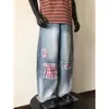Jeans de retazos a cuadros rasgados retro americanos de moda para hombres y mujeres, pantalones anchos de pierna holgada estilo callejero boyfriend con bloqueo de color