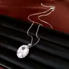 Set de aretes, collar y anillo de circonia con aguja de plata transfronterizo, joyería de alta gama de lujo ligero con un toque exquisito y elegante