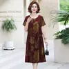 Elegante y estiloso vestido de verano estampado de manga corta para mujeres de mediana edad y mayores, vestido midi adelgazante de talla grande para madres