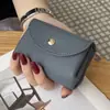 Billetera Corta de Cuero Genuino 2026 Nueva Cartera Estilo Japonés Monedero Unisex Mini Cartera de Monedas Mayoreo para Exportación