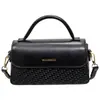 Bolso pequeño retro de alta gama para mujer 2026 nuevo elegante versátil bandolera bolso de mano de color sólido exquisito bolso cuadrado pequeño