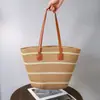 Bolsa de Tecido de Grande Capacidade Feminina Nova Listrada Estilo Moderno Bolsa de Ombro de Palha de Alta Qualidade para Mulheres Bolsa Tote