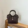 Bolso tipo cubo de alta gama transfronterizo de nicho, bolso cruzado moderno y versátil, bolso de mano casual y simple, bolso de hombro, bolso para el trabajo