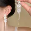 ¡Hermoso! Pendientes de Borla de Concha Flor Plateada 2026 Pendientes Súper Modernos para Caras Cuadradas y Redondas, Accesorios para Orejas Únicos y Hermosos
