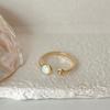 Anillo de perla de conejo con diseño de nicho para mujer, estilo Hepburn, moderno, elegante, de celebridades de Internet, combinable, de alta gama, abierto.