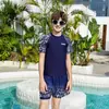 Traje de Baño Infantil al por Mayor 2026 Modelo Nuevo Traje de Baño de Entrenamiento Transpirable de Manga Corta para Niños Mayores y Adolescentes