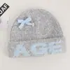 Chapéu de tricô de lã doce estilo coreano para mulheres, novo gorro para caminhada ao ar livre outono e inverno, chapéu para clima frio que afina o rosto