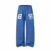 Calça comprida versátil estilo coreano-americano com estampa flockada bordada, perna larga, caimento relaxado, calça de moletom esportiva casual para homens e mulheres