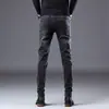 Pantalones de mezclilla de alta gama en negro y gris de Hong Kong para hombre, nueva colección primavera/otoño 2026, modernos, corte slim, pantalones casuales elásticos