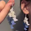 Pendientes de Borla con Mariposa Calada Azules y Blancos para Mujer 2025 Nuevo Estilo Pendientes Exquisitos Lujo Accesible Pendientes de Gama Alta de Nicho Venta al por Mayor