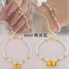 Nuevo Otoño Nanyang Perla de Concha Orquídea Campana Dorada Antigua colgante accesorios de oro arena pulsera dulce pulsera para mujeres