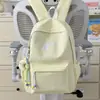 Mochila de nailon de color liso de alta moda 2026, bolsa de secundaria moderna y ligera con gran capacidad