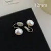 Pendientes de clip tipo espiral para mosquitos estilo francés, sin perforar, pendientes de botón de perla de alta gama estilo Hepburn para otoño e invierno, de nicho, versátiles y delicados
