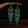 Pendientes de borla de cristal de estilo nacional Pendientes de temperamento bohemio Accesorios largos retro para bufanda Una generación de mujeres para el cabello