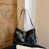 Otoño 2026 Nuevo Color Sólido Elegante Moda Diseño de Nicho Simple para Viajes Diarios Bolso de Axila Bolso Cruzado de Hombro Único para Mujer