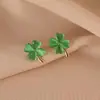 Pendientes de Moda para Viajar Trébol de Cuatro Hojas Diseño Elegante de Nicho Sentido de Diseño Lujo Ligero Pendientes de Gama Alta Joyería para Orejas de Mujer sin Agujeros