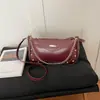 Comercio exterior cadena artística tachonada única nueva vintage ligera de moda bandolera hombro baguette pequeño cuadrado para mujer
