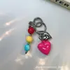 Estilo Ins Bloques de Color Corazón de Caramelo Colgante para Funda de Teléfono Soporte para Tarjetas AirPods Decoración Versátil Creativa Colgante para Bolso de Moda