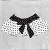 Conjunto de Tres Piezas Transfronterizo Europeo y Americano Ins Estilo Nuevo Lindo, Moderno y Sexy Top de Cuello Halter con Lunares y Lazo + Falda