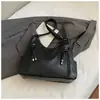 Bolso de mujer de gran capacidad, nuevo modelo 2026, bolso cruzado, diseño de nicho texturizado, adecuado para estudiantes universitarios, bolso de hombro para el trabajo, bolso tote