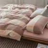 Juego de cuatro piezas de algodón 100% teñido en hilo y lavado, algodón puro, sin marca, suministrado por el fabricante, funda de edredón de alta calidad, sábana bajera de estilo japonés, ropa de cama al por mayor