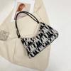 Bolso de hombro de lona de moda urbana para mujer, primavera 2023, nuevo bolso de clase para estudiantes de gran capacidad