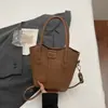 Bolso tote tipo cubo, sencillo y casual, para mujer, nueva colección primavera 2026, moderno y a la moda, con una textura única, se puede llevar como bolso de hombro o bolso cruzado