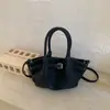 Bolso Moderno y Elegante con un Ambiente Relajado, Nuevo Bolso Tote Pequeño Primavera 2026, Bolso Cubo Plegado, Bolso Cruzado