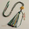 Cuerda de juego para colgar en el coche tejida a mano Xizang hilo de algodón cordón hilo de algodón frotado a mano borla Thangka nudo Wenchang cordón antiguo