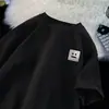 Fornecimento direto da fábrica T-shirt masculina de verão estilo Harajuku Hong Kong com bordado de rosto sorridente, manga curta, waffle americano, marca de tendência, combina com tudo, plus size