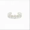 Nuevo anillo de pie de flor hueca para joyería europea y americana, anillo articulado Joker de personalidad de moda, joyería de pie Joker 7470