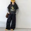 Camisa Básica Estilosa de Desenho Animado para Meninas Outono 2026 Nova Versão Coreana para Crianças Maiores Moda Blusa Falsa de Duas Peças Tendência