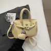 Bolsa de Mão Quadrada Pequena Moderna Tendência Nova Primavera 2026 Bolsa de Ombro Transversal Feminina Estilosa de Nicho