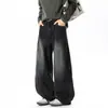 Calça jeans masculina estilo americano de rua com perna curva, cinza escuro, lavagem desgastada, perna larga, com design de retalhos curvos, calça longa da moda