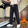 Pantalones casuales holgados versátiles para hombre en otoño e invierno, forrados de felpa, color liso, transpirables, elásticos, con una caída fresca, modernos pantalones de chándal nuevos