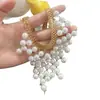 Colar de pérolas com borlas estreladas multicamadas versátil da moda europeia e americana, acessório de corrente para clavícula nupcial requintado de luxo leve francês