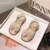 Sandalias para Niña 2026 Verano Nuevos Zapatos Infantiles Zapatos de Princesa Niña Lazo de Cristal Suela Suave Sandalias de Playa