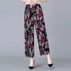 Calça de Seda Gelada Nova Estilo Verão para Mães, Calça Floral com Cintura Elástica, Anti-Mosquito, Modelagem Solta, Calça Casual Versátil, Calça de Vovó