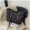2026 Elegante Estampado Floral Nueva Primavera Gran Capacidad Moderna Cadena para Mujer Bolso de Hombro Tote para Viajes