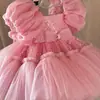 Vestido rosa de niña con gran lazo, vestido de princesa con mangas abullonadas y lentejuelas, falda de tul esponjosa para fiestas de cumpleaños y desfiles de damas de honor.