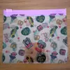 Saco com zíper de impressão colorida em PVC Bolsa de mão em PVC Saco de embalagem plástica em PVC Saco para joias em PVC Saco para cosméticos em PVC