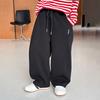 Aimo Beibei Infantil 2025 Estilo Primavera Calças de Moletom Soltas para Meninos e Meninas com Etiqueta Emendada Calças Cimitarra Calças Esportivas da Moda