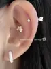 Uña de Hueso de Oreja de Garra de Gato Linda Sentido Avanzado Diseño de Nicho Uña de Oreja de Garra Uña de Oreja Espiral Pendientes Sencillos Versátiles para Mujer