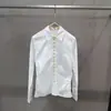 Moda Cruzada Outono/Inverno 2026 Versátil Botão Metálico de Fileira Única Manga Longa Estilo Europeu e Americano Inspirado no Instagram Emagrecedor Camisa Casual